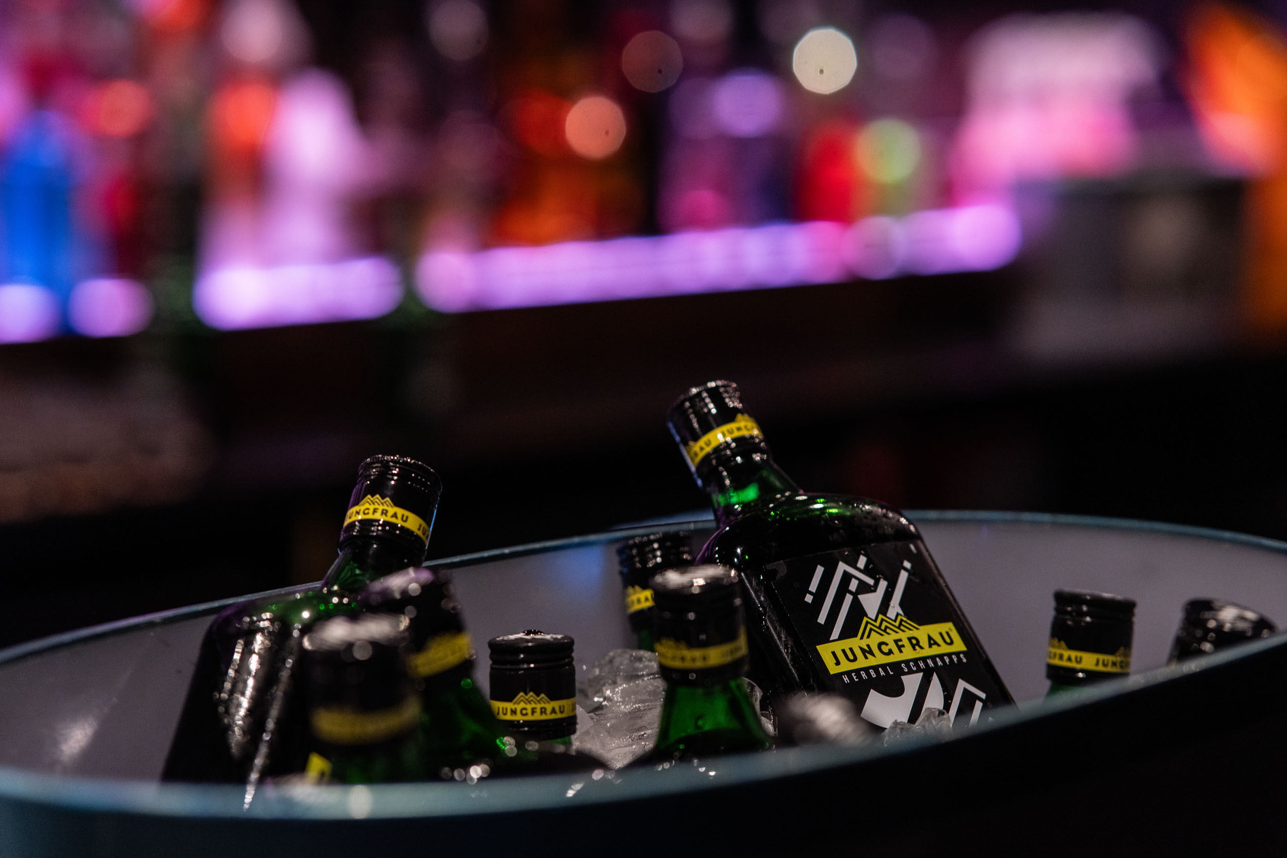 Bottles chilling in an ice bucket at the Elev8 bar